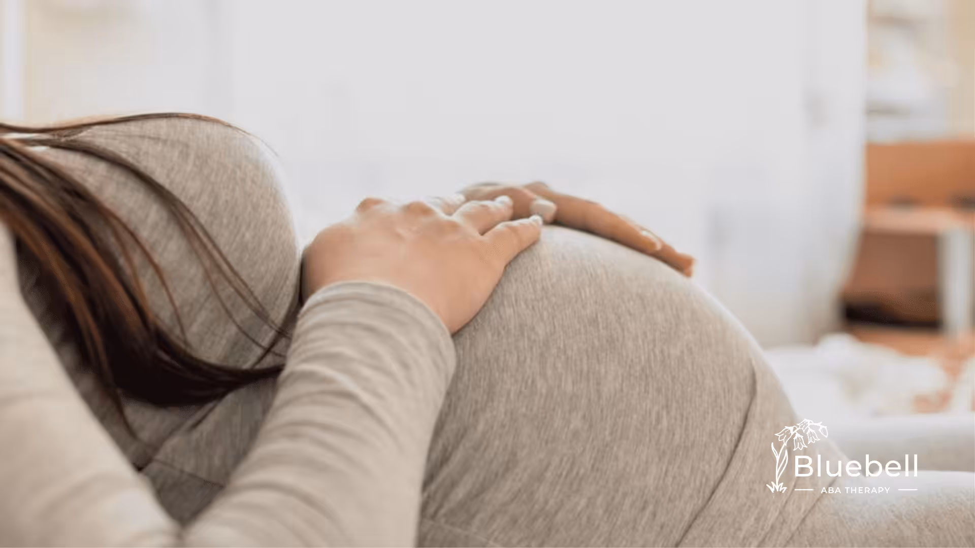 A pregnant lady lying down