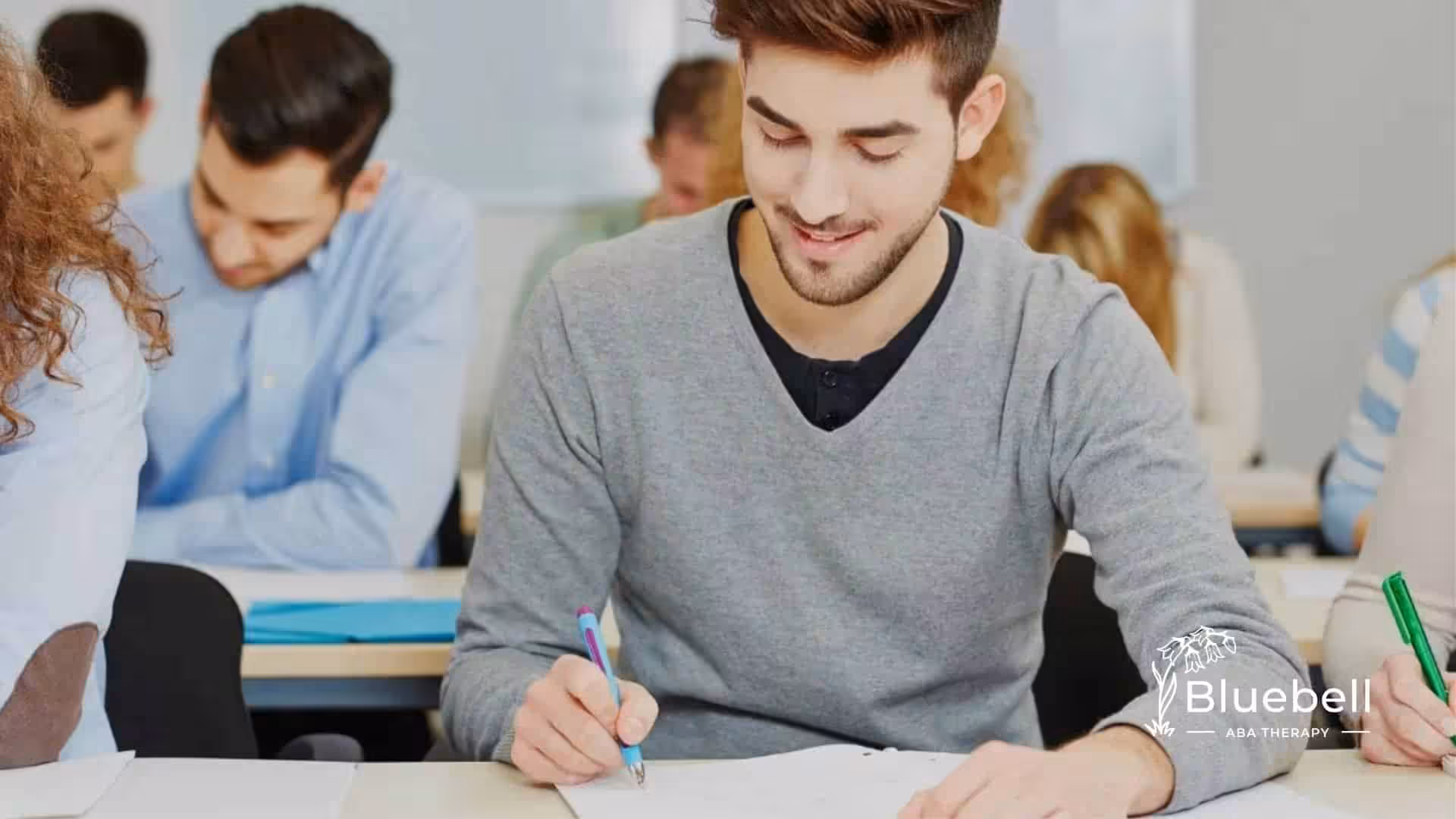 Smiling BCBA student confidently taking the BCBA exam at a testing center in North Carolina.