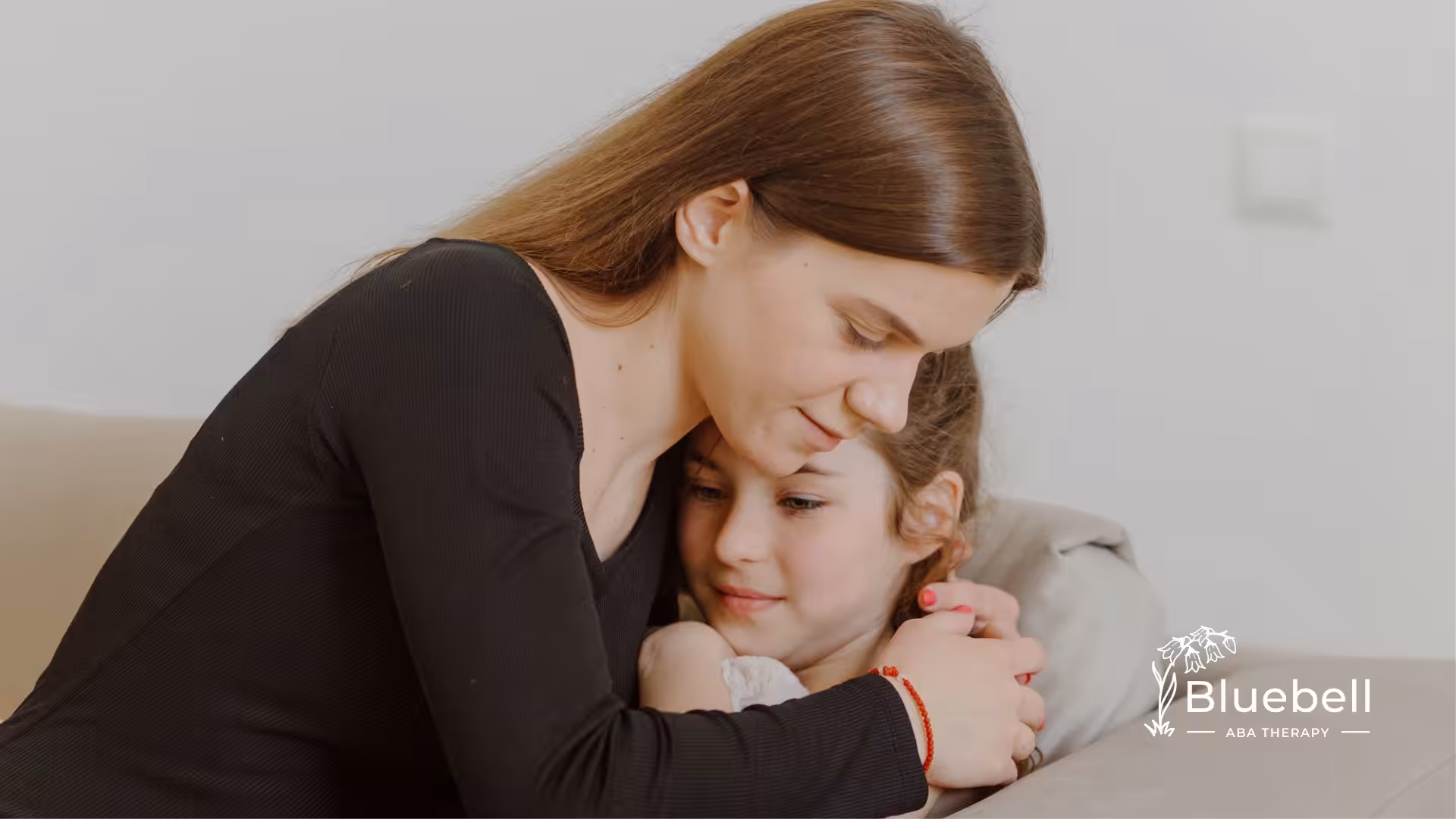 A mother hugging her child with autism