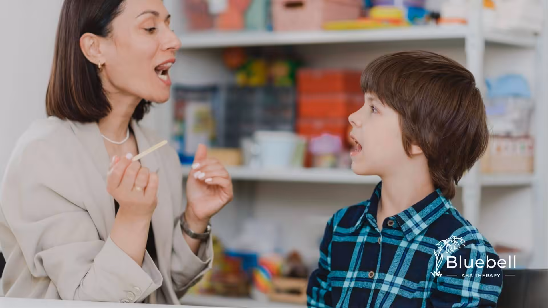 A BCBA is working with an autistic child to improve his speech.