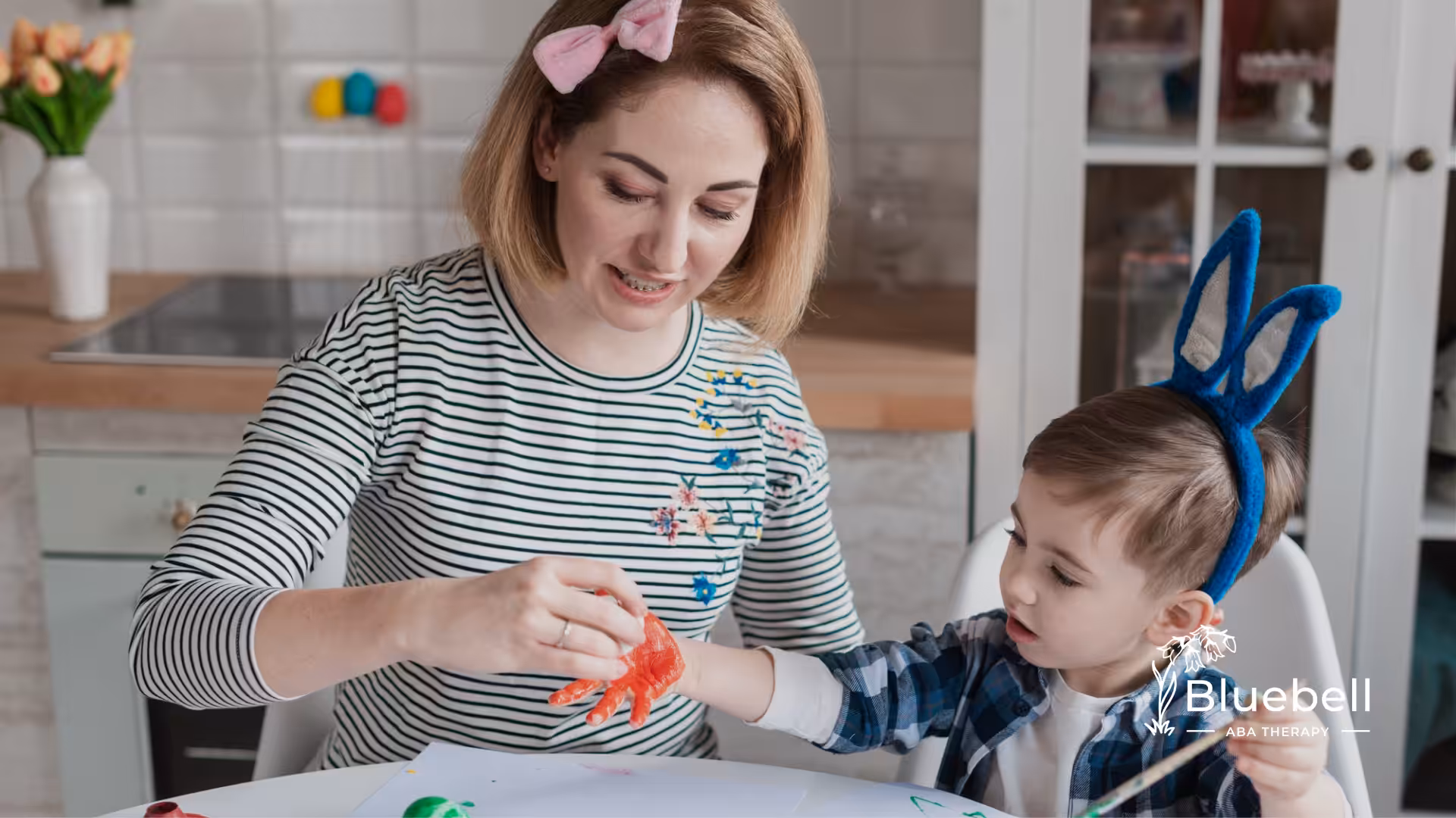 A child with autism and his ABA therapist during ABA therapy